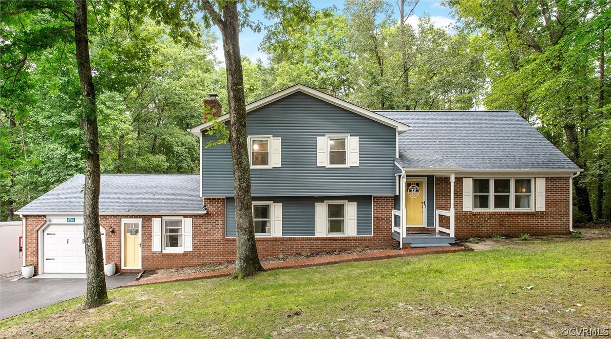 12808 Middlebrook Road Chester, VA 23831 - Photo 1 of 35 front view of a house with a yard