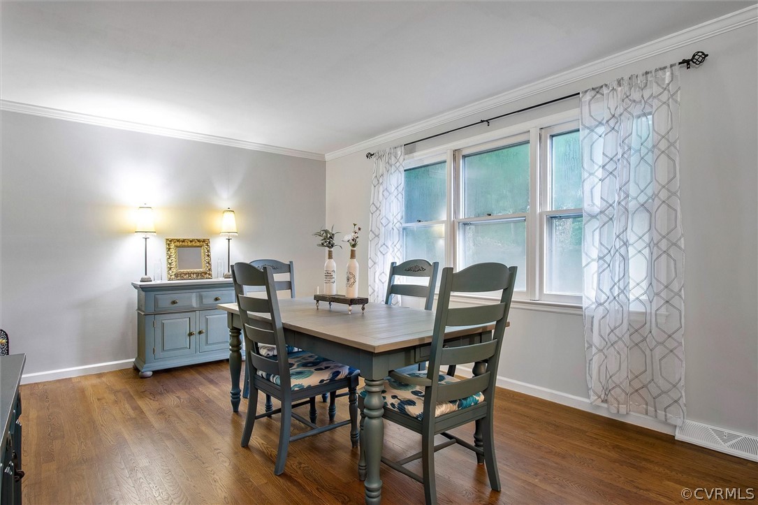 12808 Middlebrook Road Chester, VA 23831 - Photo 15 of 35 a dining room with furniture and wooden floor