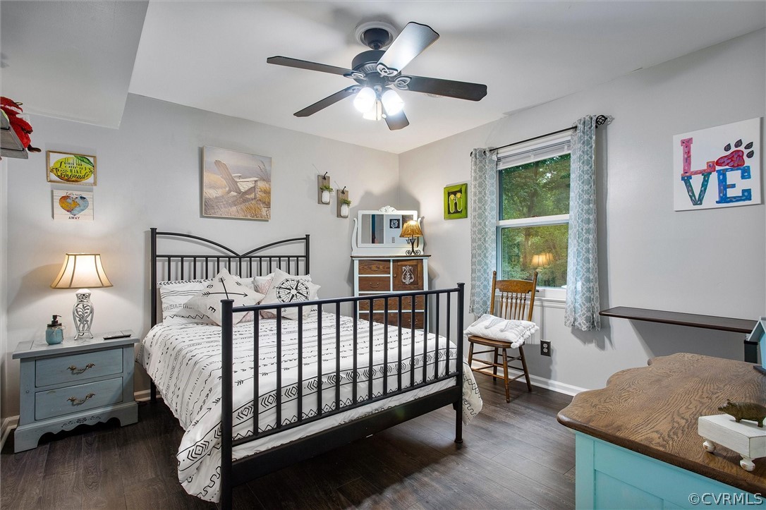 12808 Middlebrook Road Chester, VA 23831 - Photo 23 of 35 a bedroom with a bed and a window