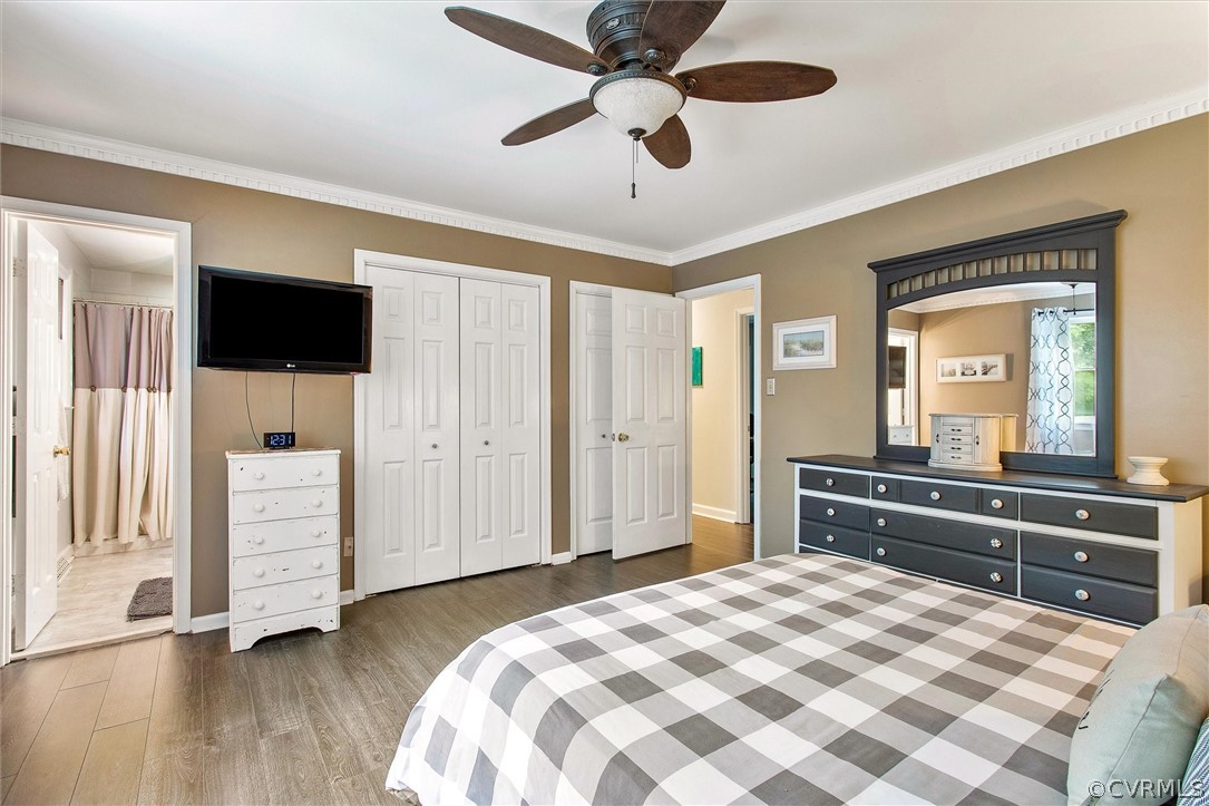 12808 Middlebrook Road Chester, VA 23831 - Photo 27 of 35 a bedroom with a bed and a flat screen tv