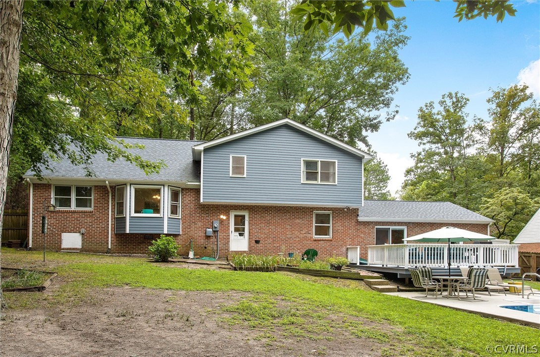 12808 Middlebrook Road Chester, VA 23831 - Photo 35 of 35 a front view of a house with a yard and trees