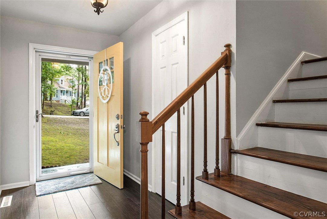 12808 Middlebrook Road Chester, VA 23831 - Photo 5 of 35 a view of an entryway with wooden floor and door