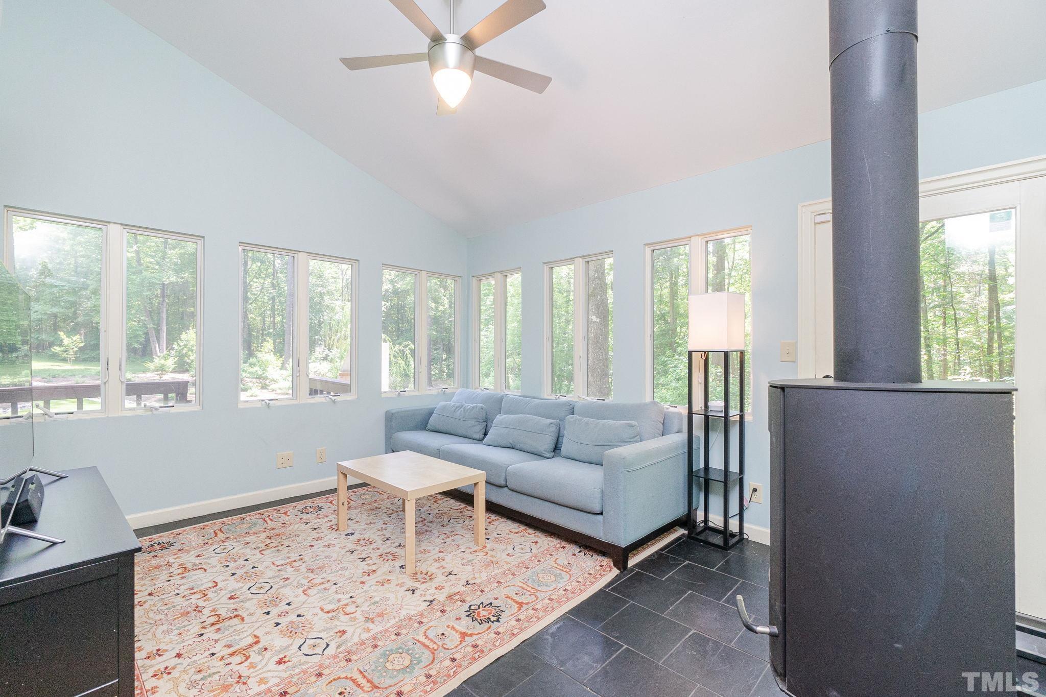 5215 Friends School Road Durham, NC 27705 - Photo 17 of 39 a living room with furniture and a large window