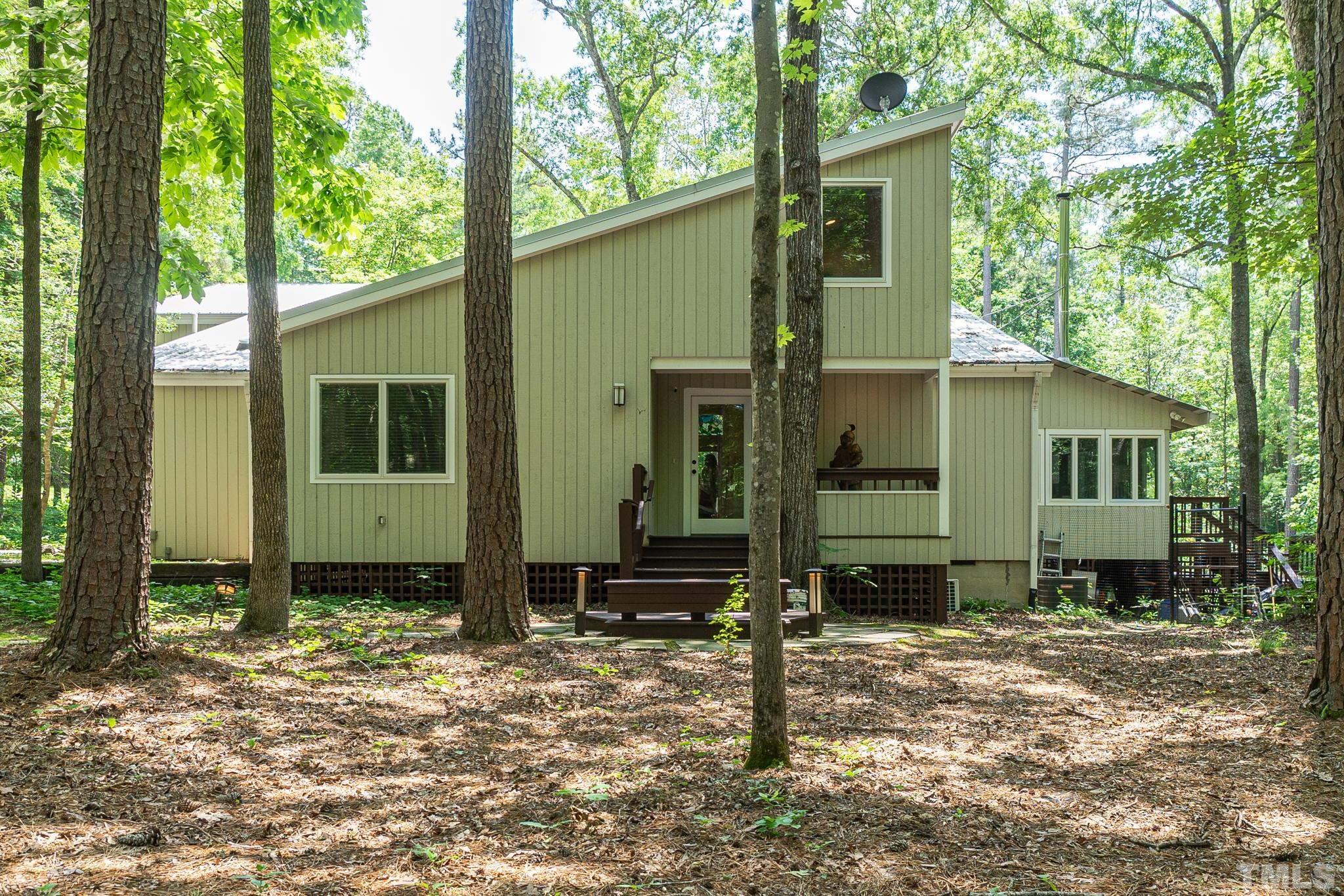 5215 Friends School Road Durham, NC 27705 - Photo 2 of 39 a front view of a house with a yard