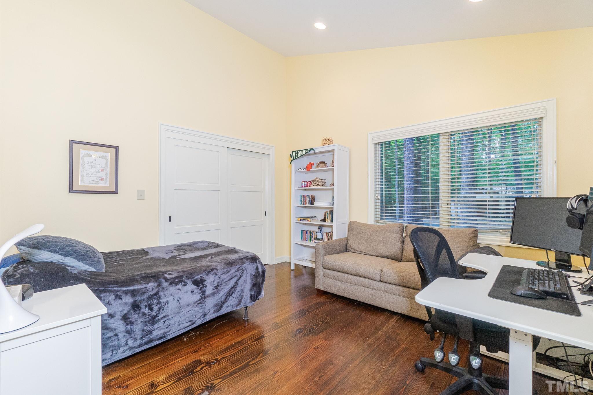 5215 Friends School Road Durham, NC 27705 - Photo 23 of 39 a living room with furniture and a large window