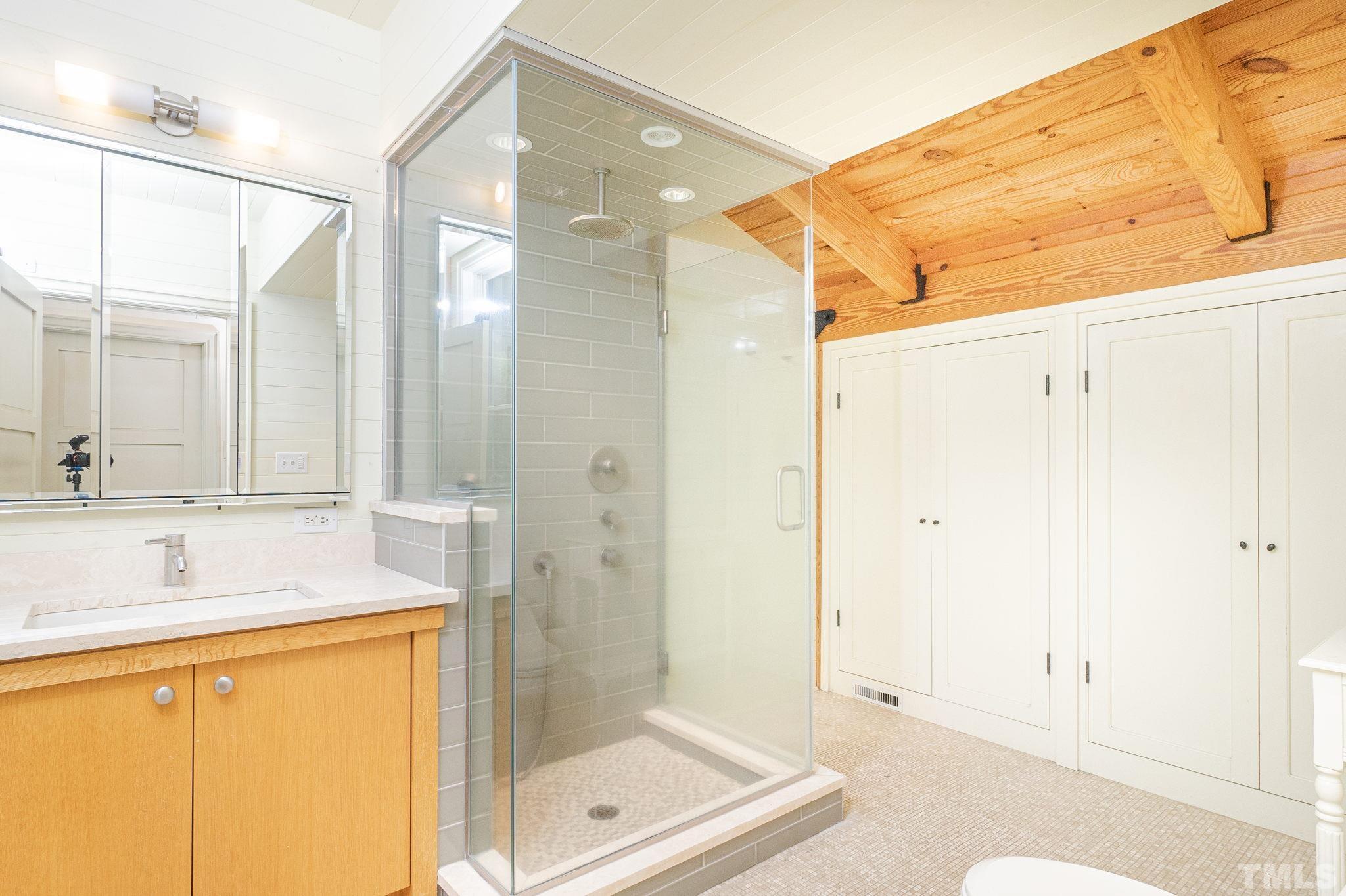 5215 Friends School Road Durham, NC 27705 - Photo 28 of 39 a bathroom with a granite countertop sink mirror and