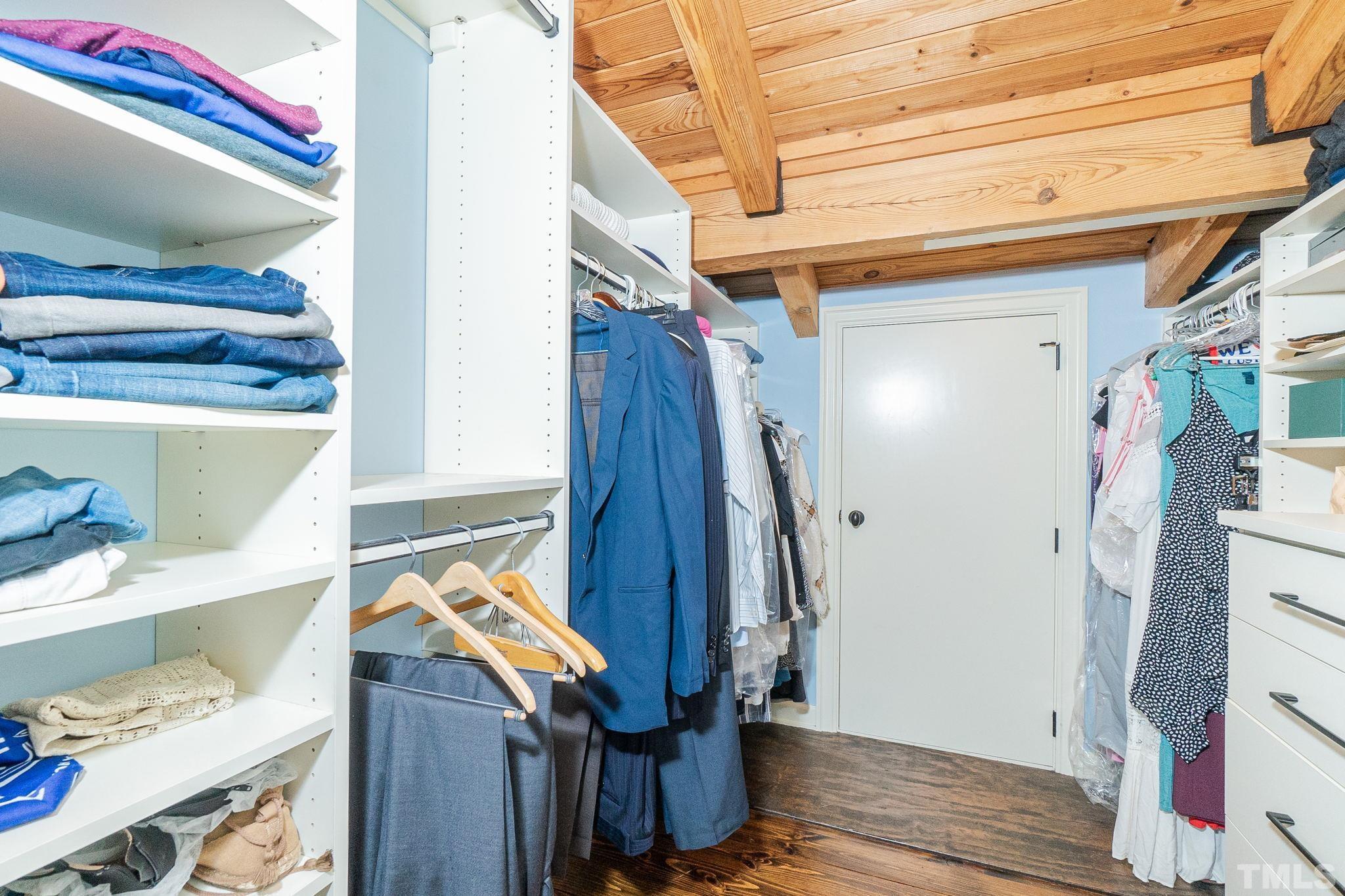 5215 Friends School Road Durham, NC 27705 - Photo 29 of 39 a view of walk in closet with clothes and shoes
