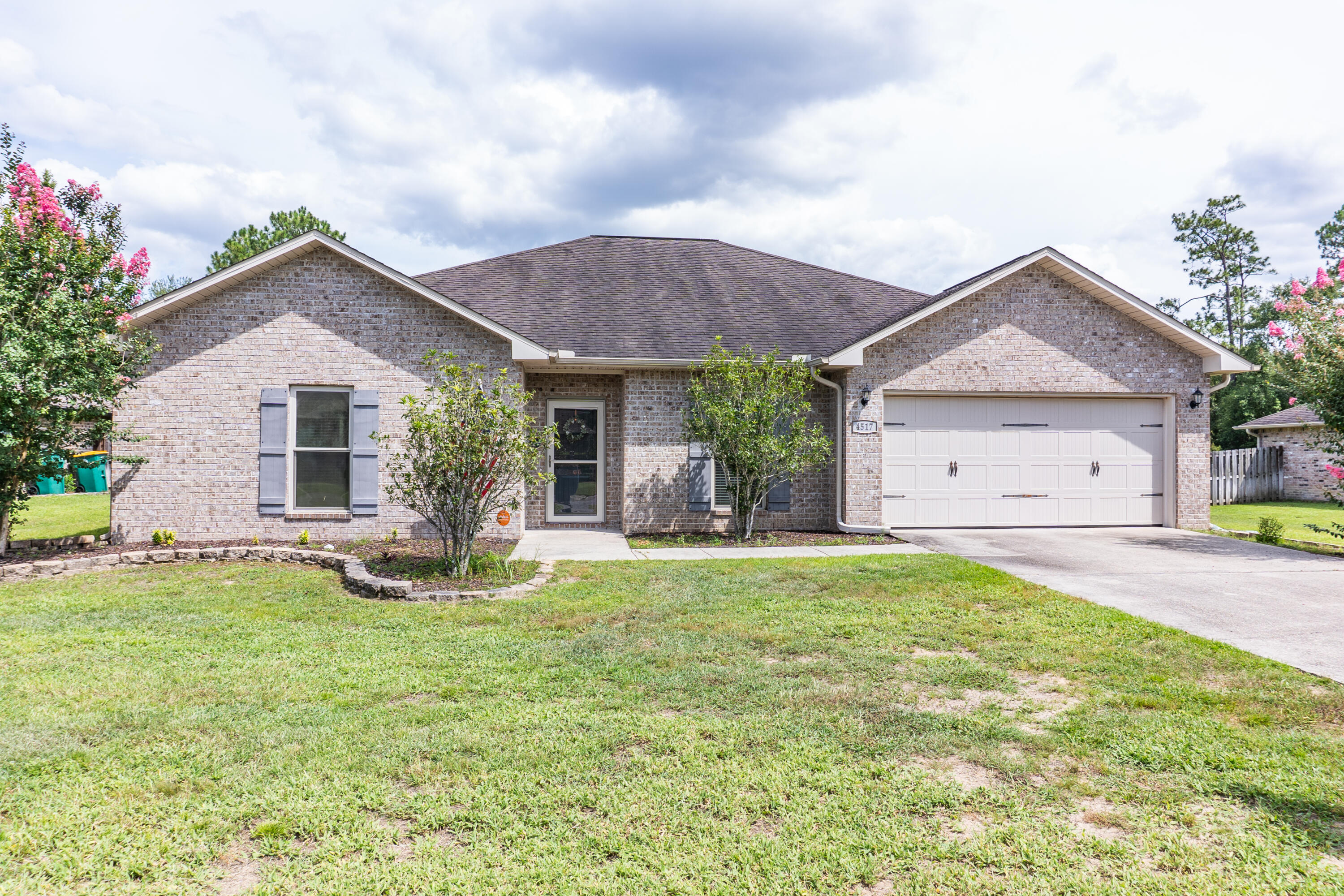 4517 Beth Circle Crestview, FL 32539 - Photo 1 of 45 a front view of house with yard and green space