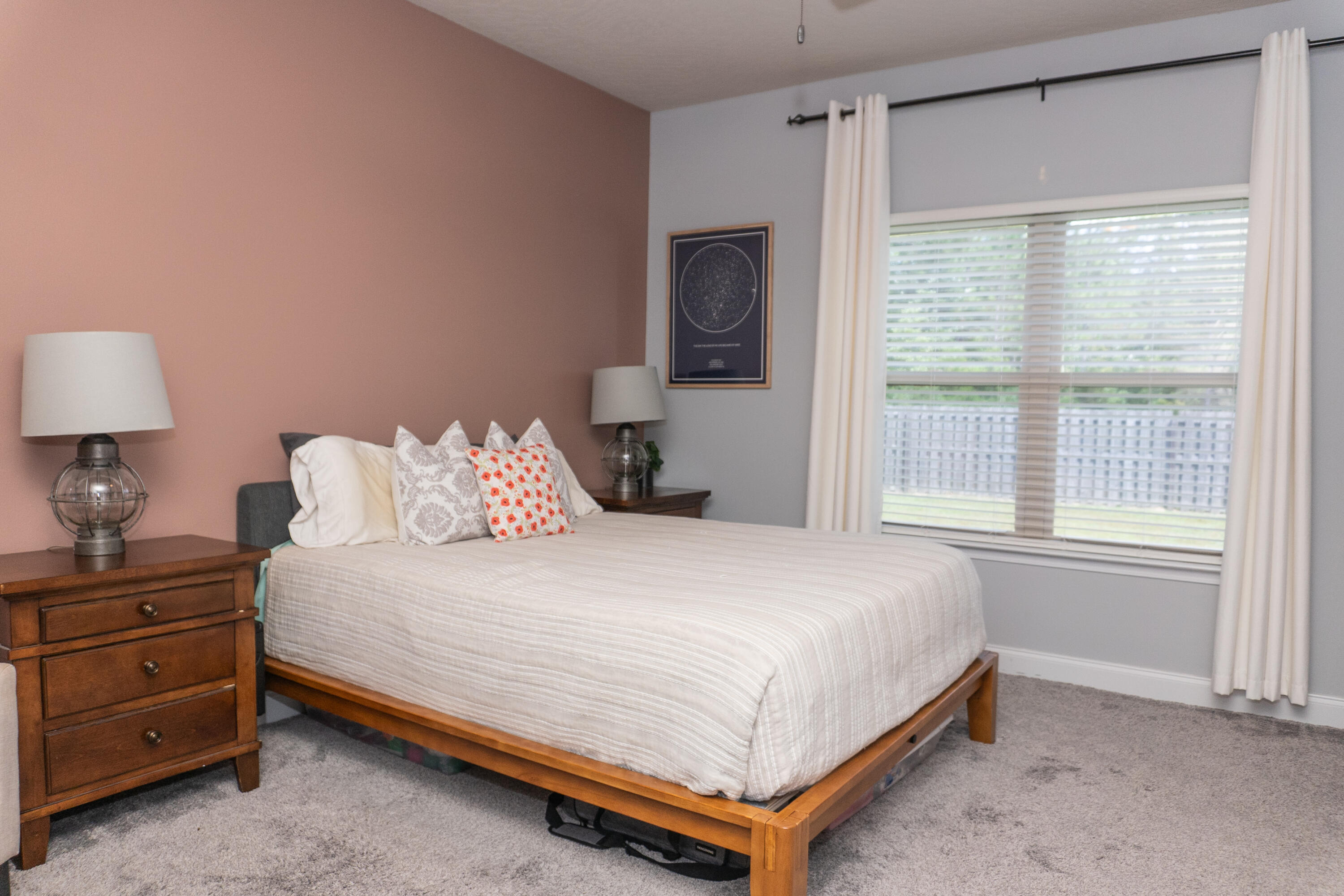 4517 Beth Circle Crestview, FL 32539 - Photo 20 of 45 a bedroom with a bed and a window