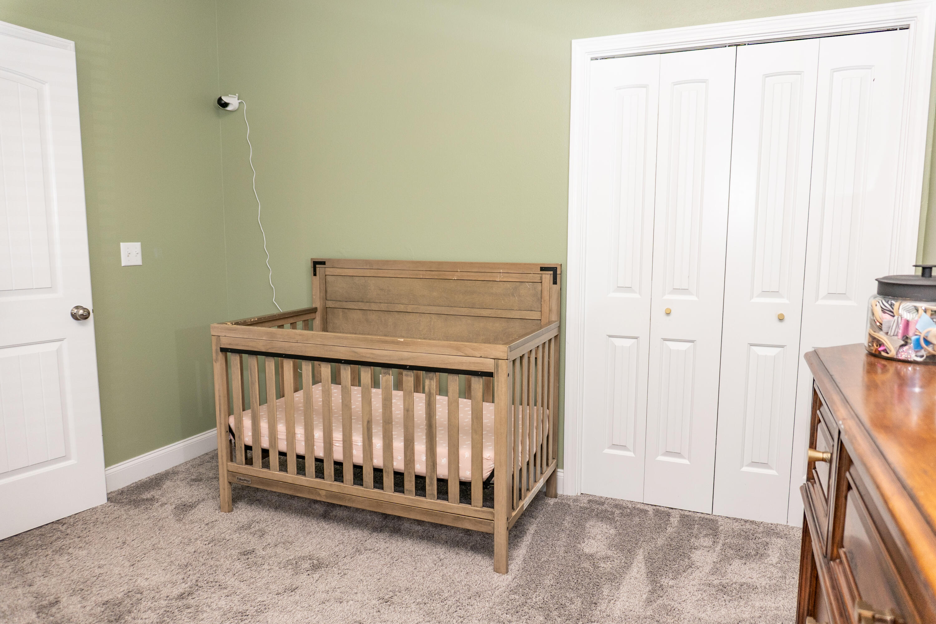 4517 Beth Circle Crestview, FL 32539 - Photo 29 of 45 a view of a room with a baby crib