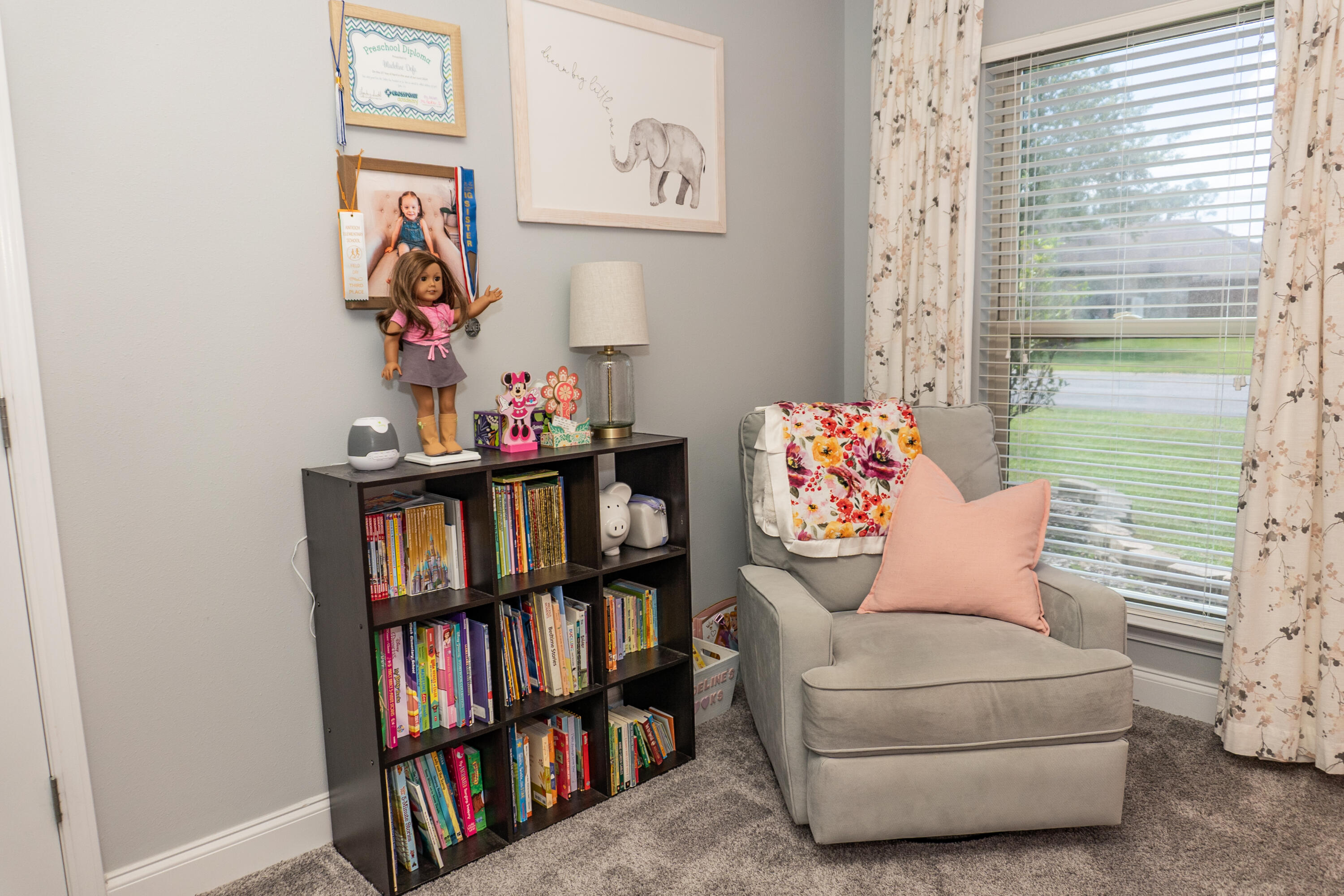 4517 Beth Circle Crestview, FL 32539 - Photo 32 of 45 a living room with furniture and a book shelf