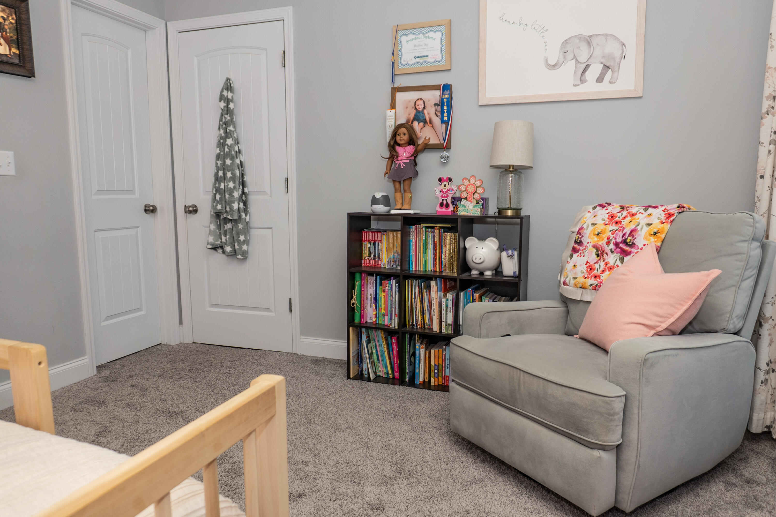 4517 Beth Circle Crestview, FL 32539 - Photo 33 of 45 a living room with furniture and a book shelf