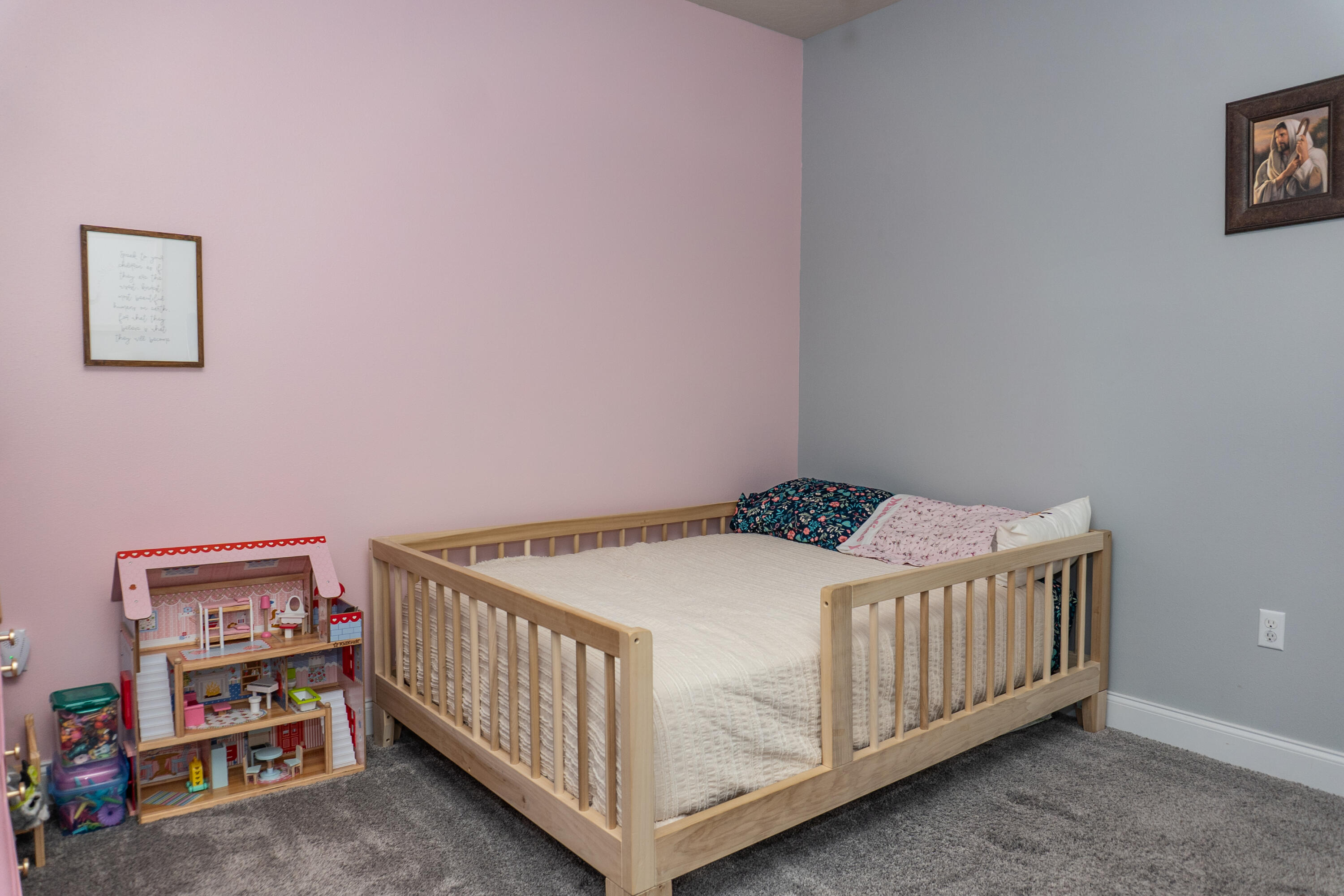 4517 Beth Circle Crestview, FL 32539 - Photo 34 of 45 a bedroom with a bed and a book shelf