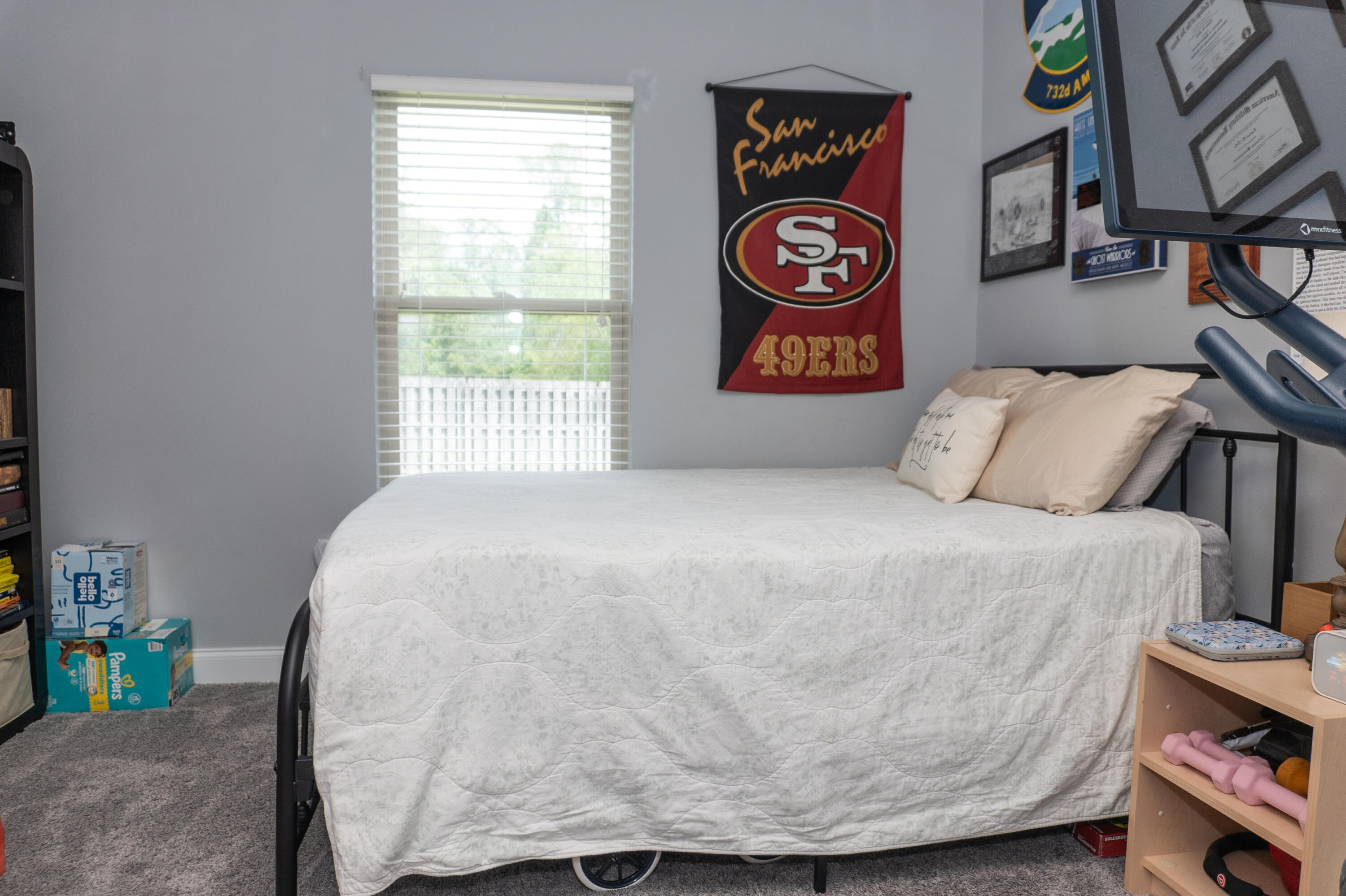 4517 Beth Circle Crestview, FL 32539 - Photo 41 of 45 a bedroom with a bed and painting on the wall