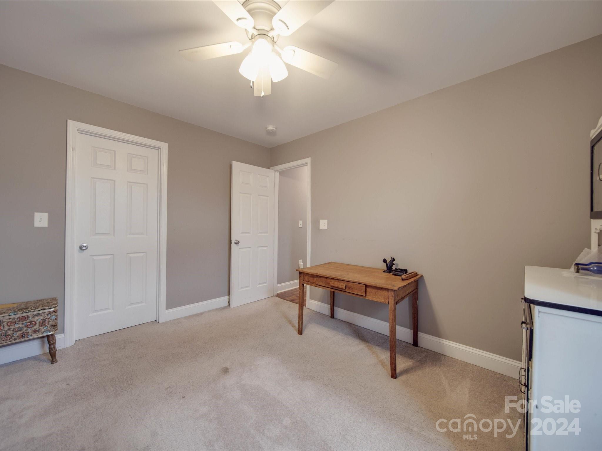 345 Springlake Road York, SC 29745 - Photo 12 of 17 a view of a room with a projector and furniture