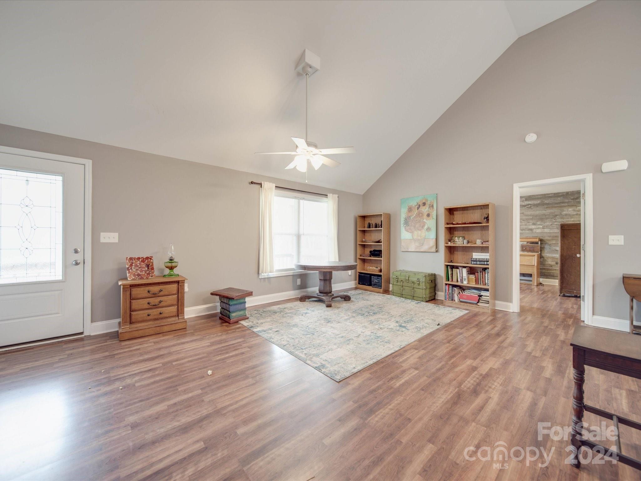 345 Springlake Road York, SC 29745 - Photo 5 of 17 a view of an empty room with window and wooden floor