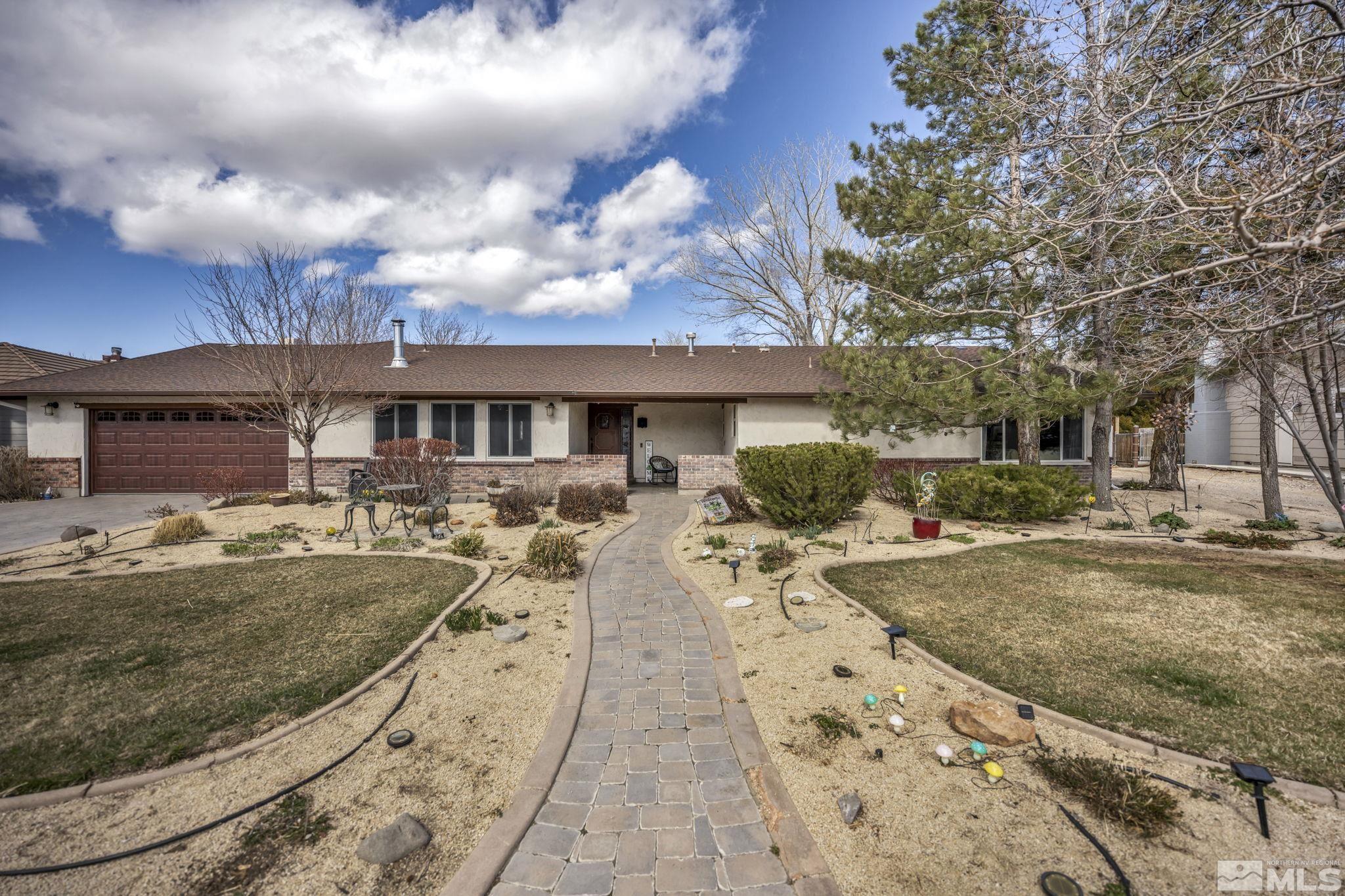 14230 Riata Circle Reno, NV 89521 - Photo 1 of 40 a view of a house with entertaining space