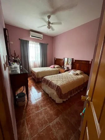 a room with furniture and glass door