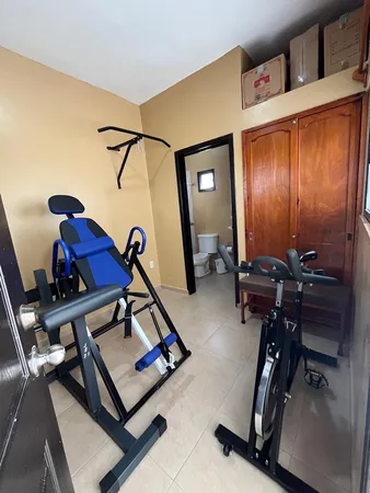 a view of backyard with a garden and outdoor seating