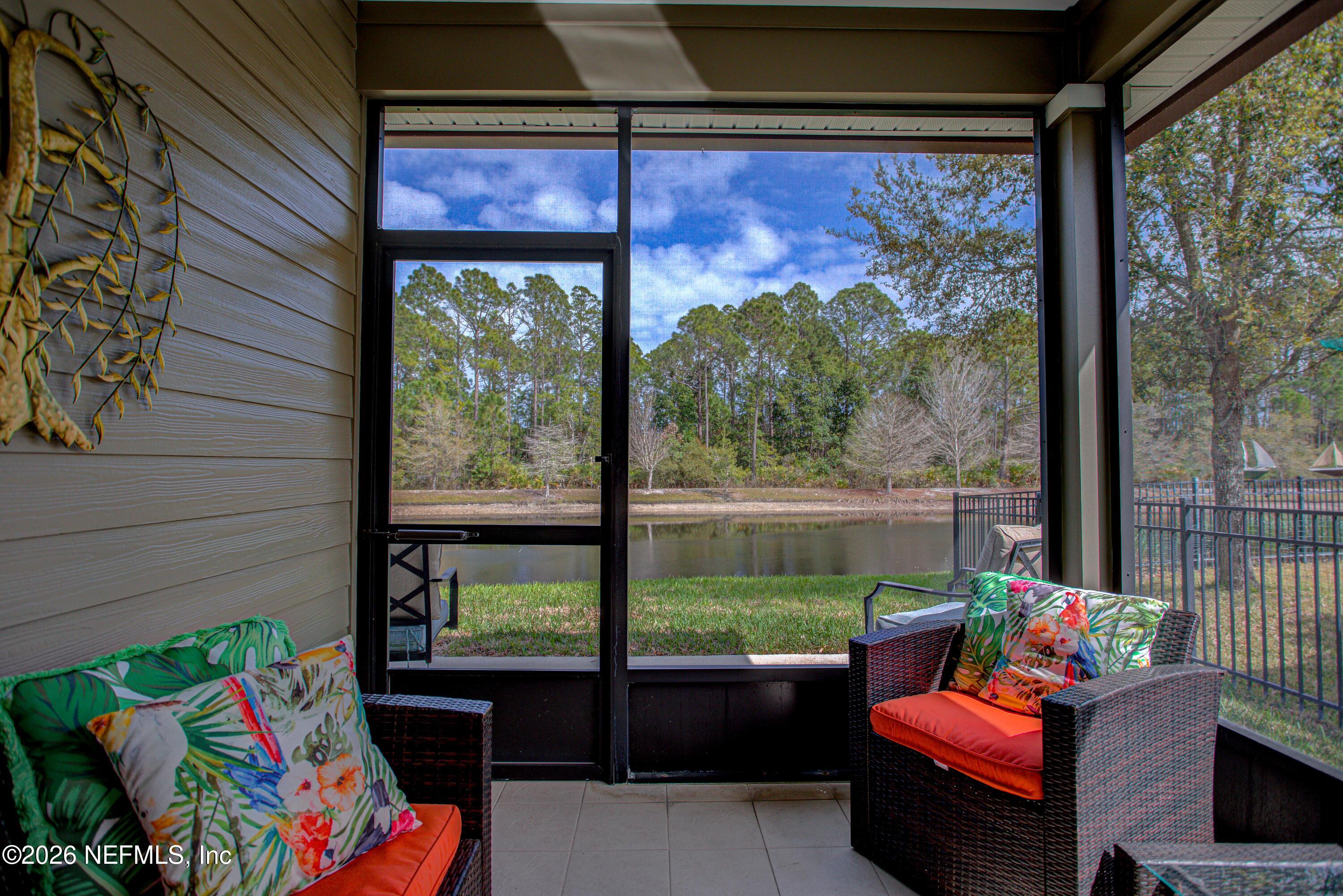 394 Balearics Drive St. Augustine, FL 32086 - Photo 21 of 26 a outdoor living space with furniture and a garden