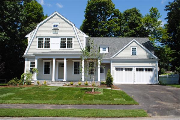 19 MacArthur Road Wellesley, MA 02482 - Photo 1 of 10 a front view of a house with a yard