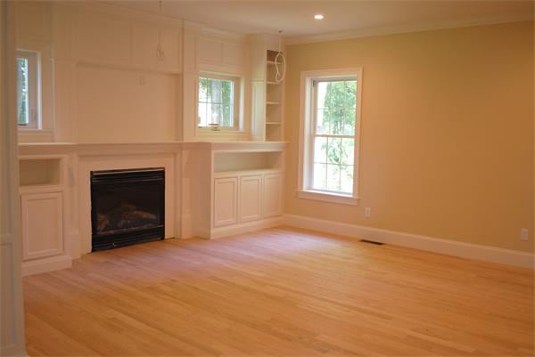 19 MacArthur Road Wellesley, MA 02482 - Photo 10 of 10 an empty room with windows and fireplace