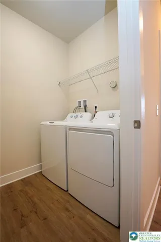 a utility room with dryer and washer