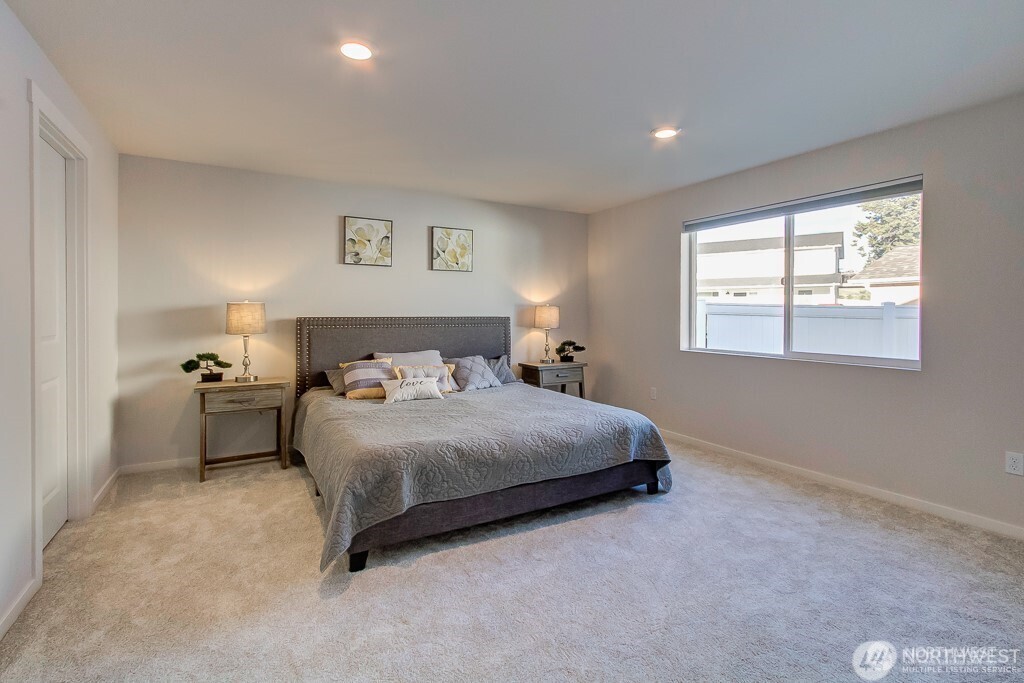 27 Jonagold Lane Manson, WA 98831 - Photo 11 of 32 a bedroom with a bed and a window