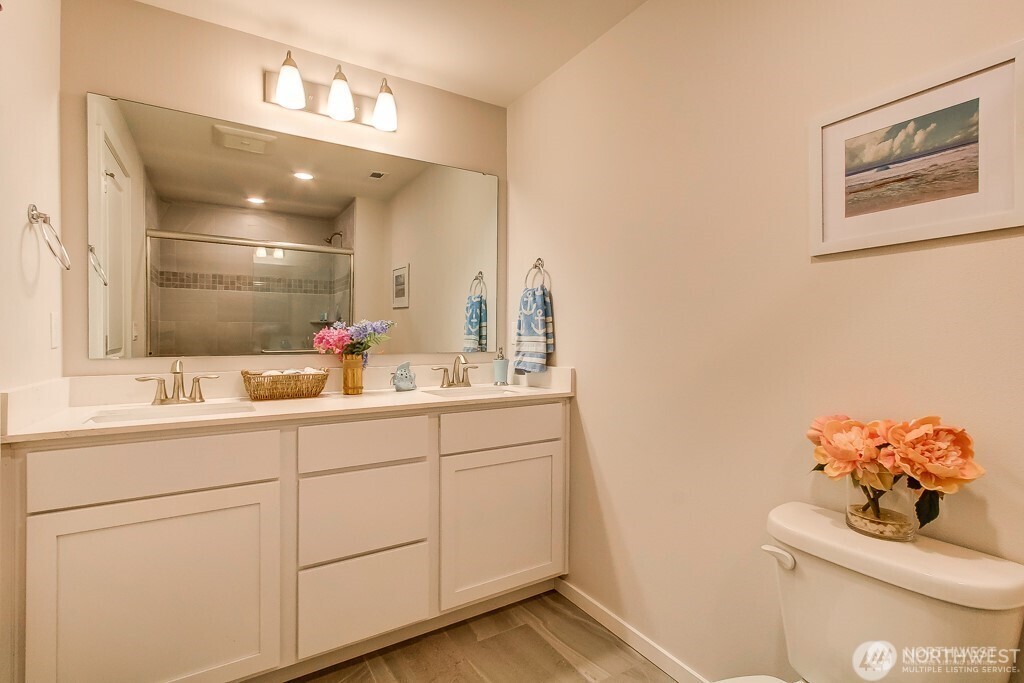 27 Jonagold Lane Manson, WA 98831 - Photo 14 of 32 a bathroom with a sink mirror and toilet