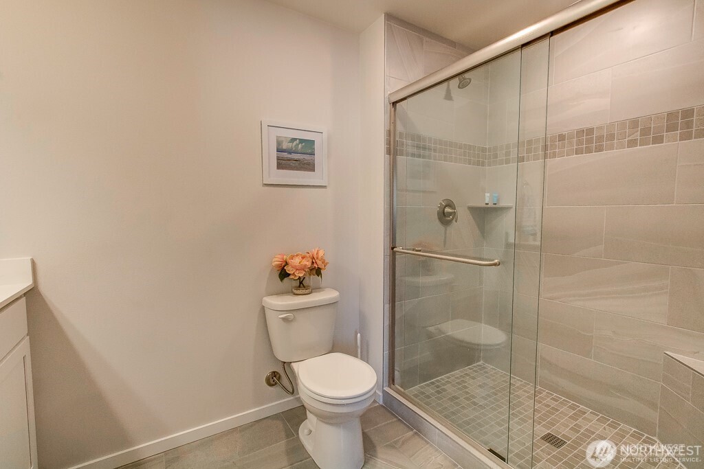 27 Jonagold Lane Manson, WA 98831 - Photo 15 of 32 a white toilet sitting next to a bathroom sink