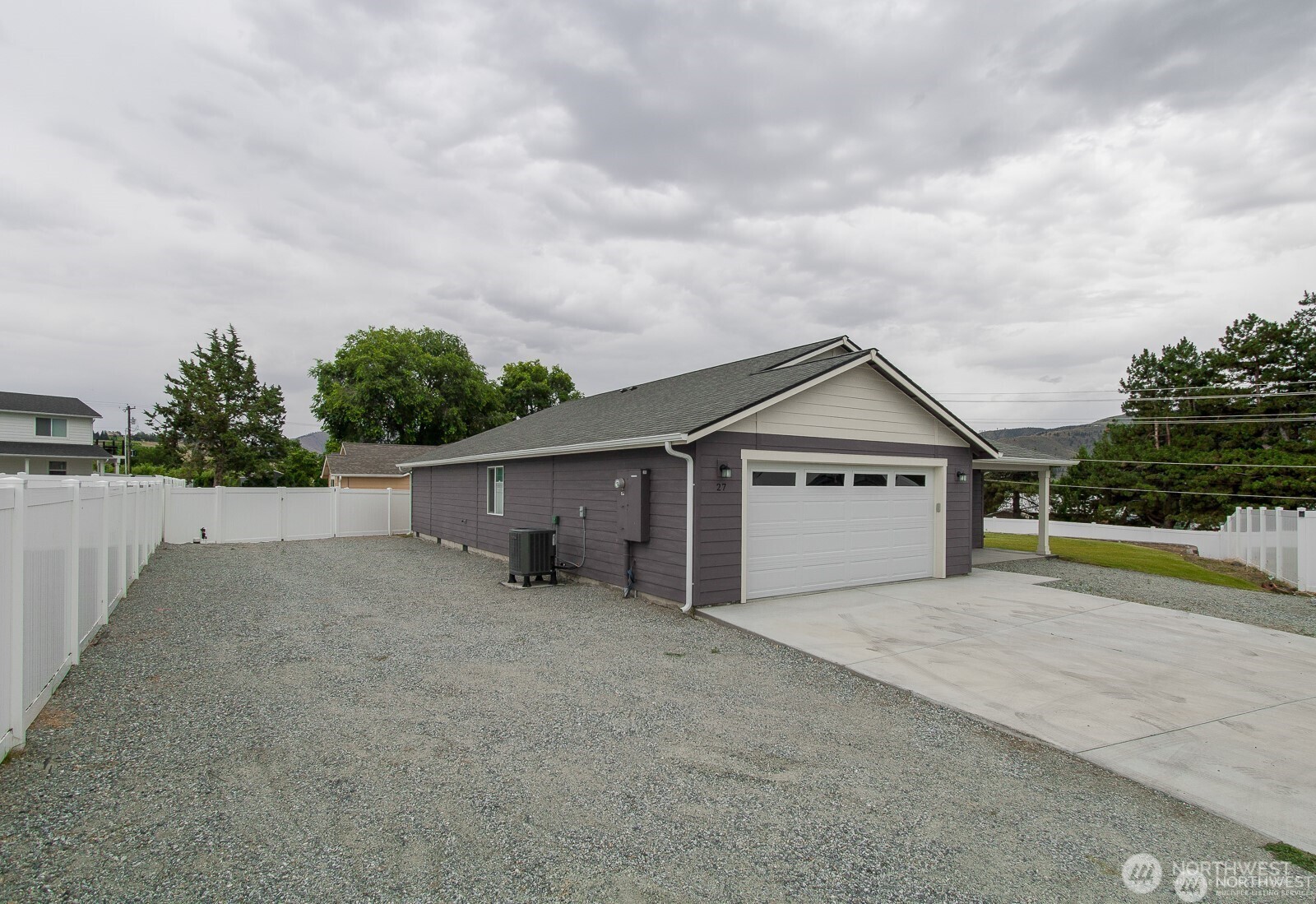 27 Jonagold Lane Manson, WA 98831 - Photo 22 of 32 a view of a house with a yard