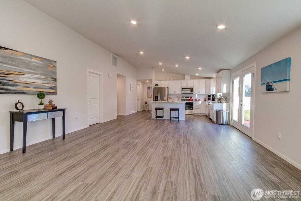 27 Jonagold Lane Manson, WA 98831 - Photo 3 of 32 a living room with furniture and a wooden floor