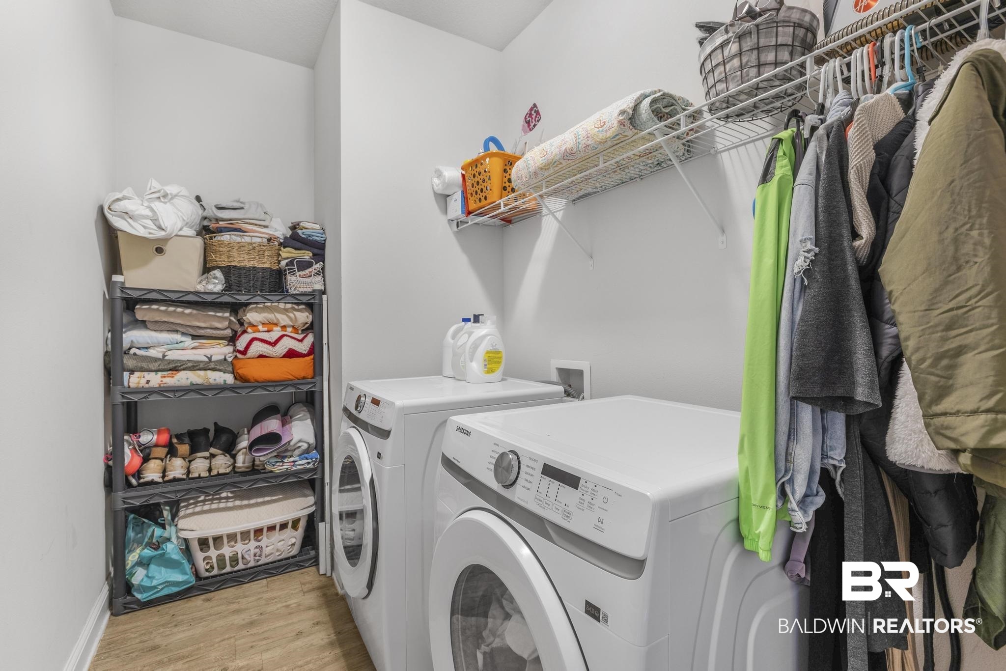 31336 Hoot Owl Road Daphne, AL 36527 - Photo 22 of 36 Washroom featuring light wood finished floors and washing machine and dryer