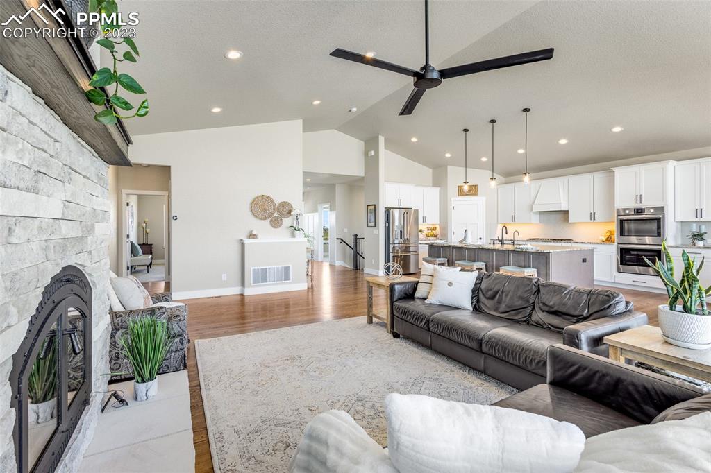 2960 Longhorn Rdg View Peyton, CO 80831 - Photo 8 of 49 a living room with furniture and a large window