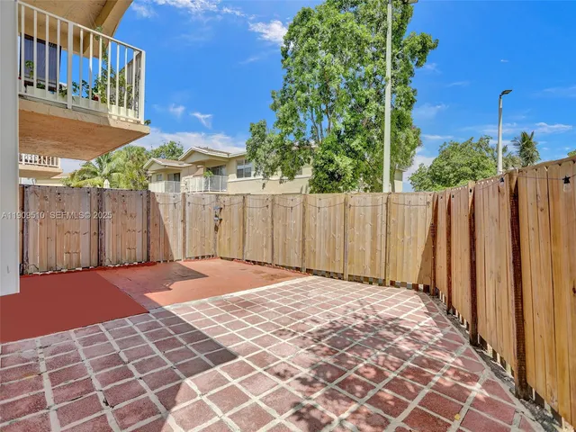 a outside view of a house with a yard