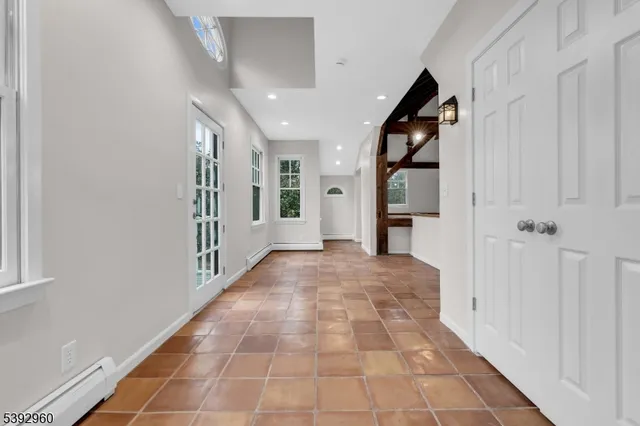 a bath room with a sink and a mirror