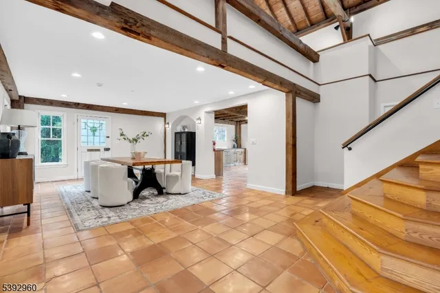 a view of room with walk in closet and bathroom