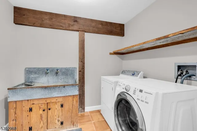 a bedroom with a large bed and a large window