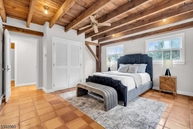 a bathroom with a bathtub and a sink
