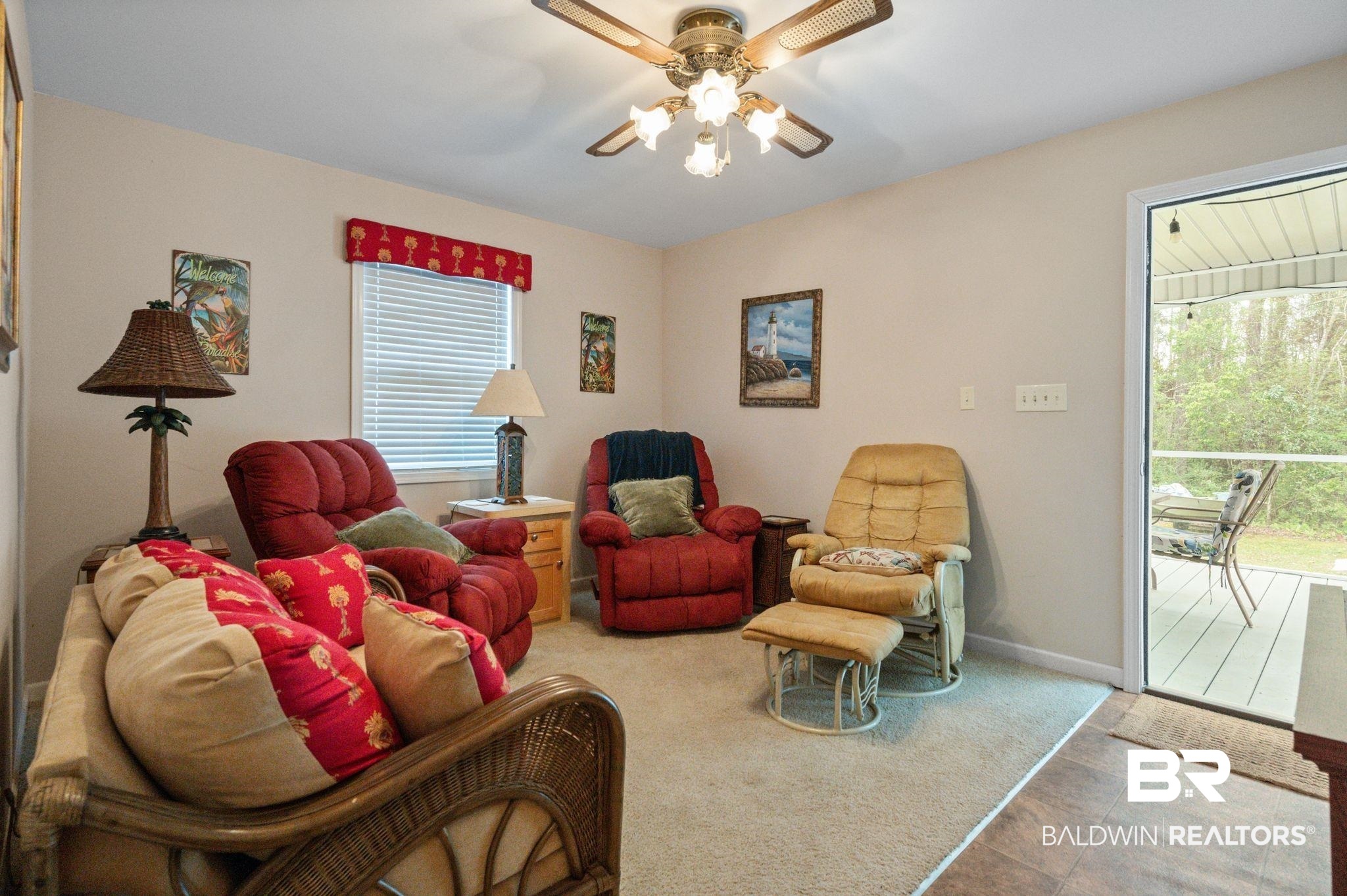24711 County Road 20, Unit A11 Elberta, AL 36530 - Photo 7 of 35 Carpeted living area with ceiling fan and baseboards