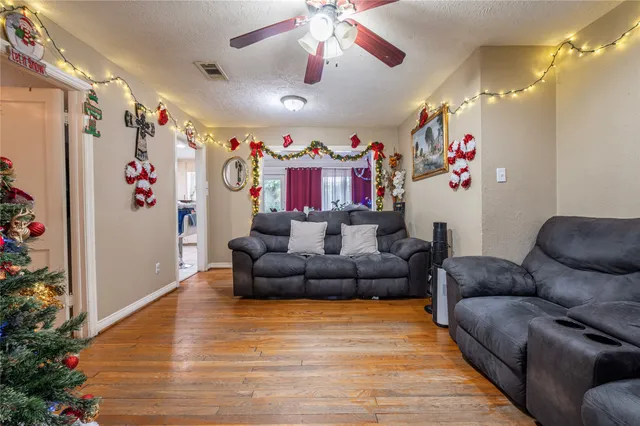 a living room with furniture and a couch