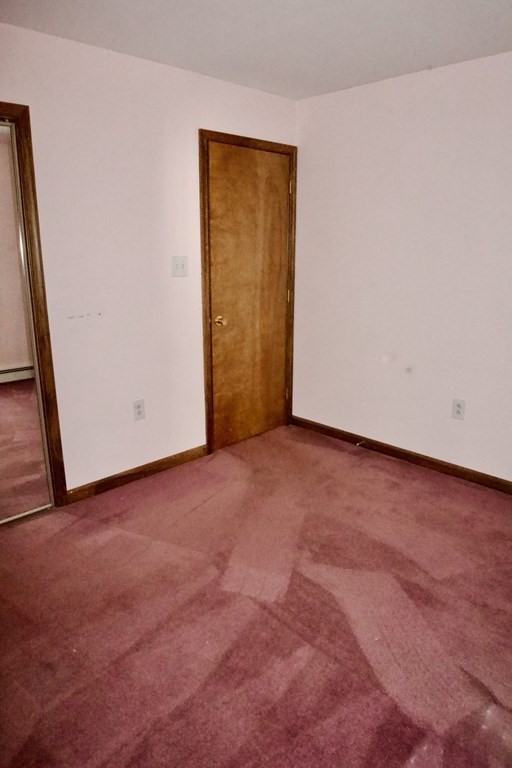 9 Pine Plain Road Georgetown, MA 01833 - Photo 13 of 26 an empty room with windows