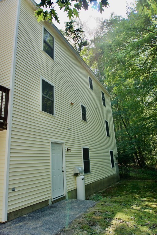 9 Pine Plain Road Georgetown, MA 01833 - Photo 25 of 26 a view of a house with a yard
