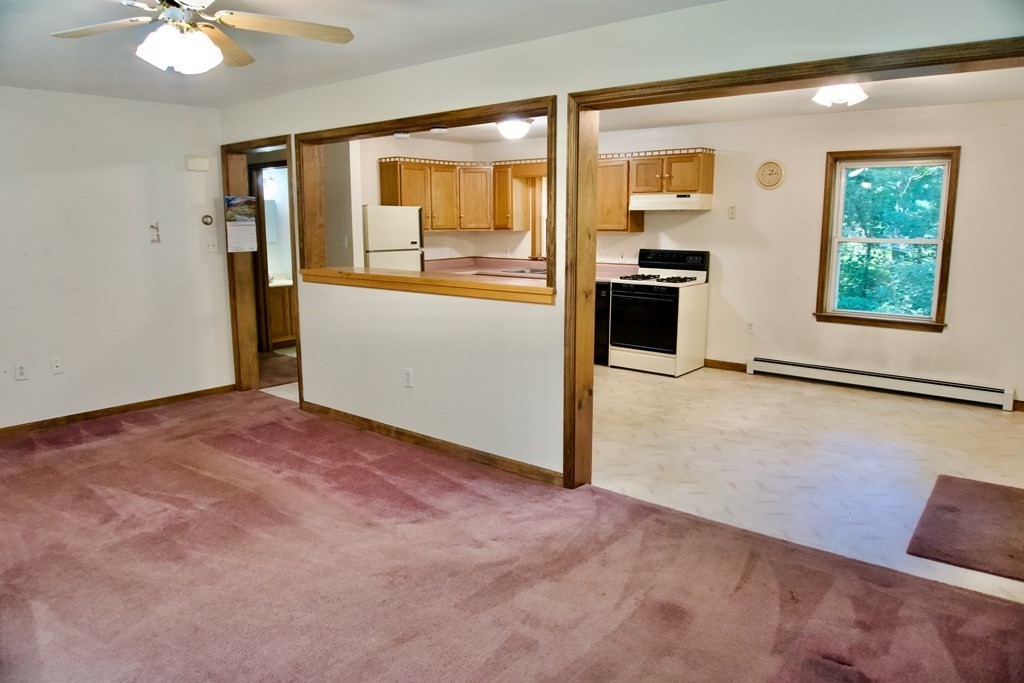 9 Pine Plain Road Georgetown, MA 01833 - Photo 8 of 26 an empty room with windows and cabinet