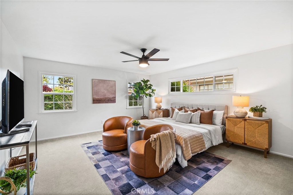 1107 Sharon Road Santa Ana, CA 92706 - Photo 21 of 37 a bedroom with bed and window