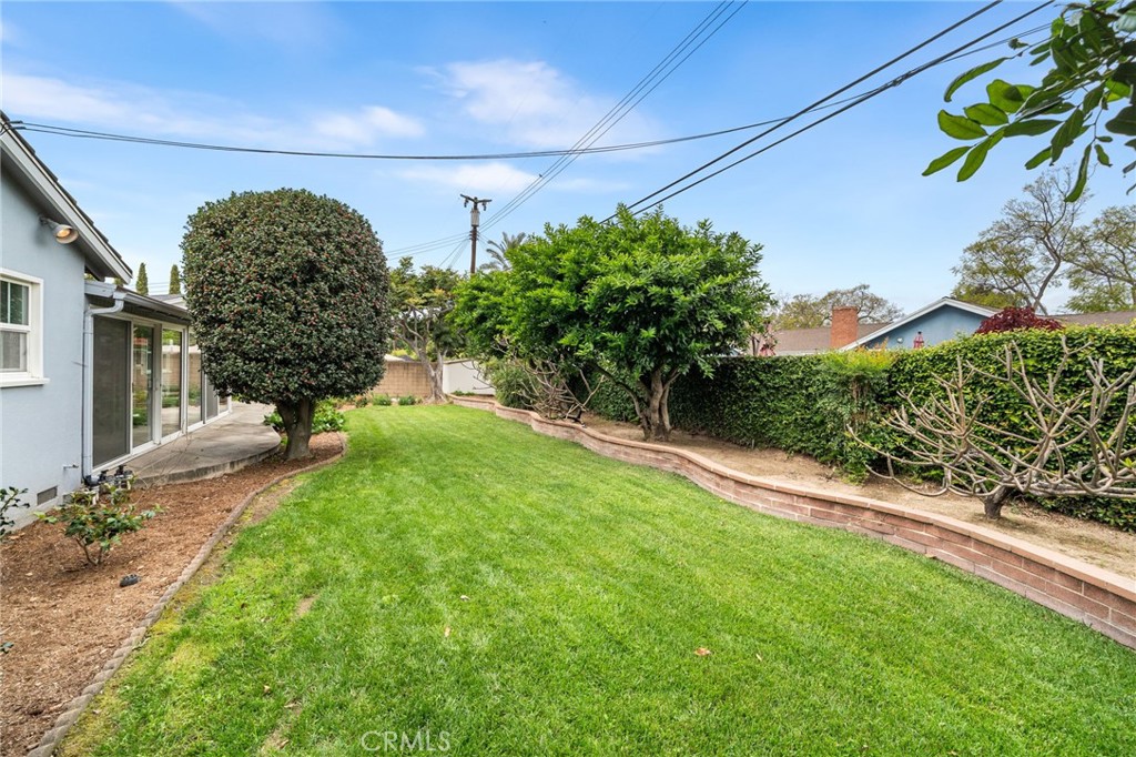 1107 Sharon Road Santa Ana, CA 92706 - Photo 34 of 37 a view of a yard with potted plants