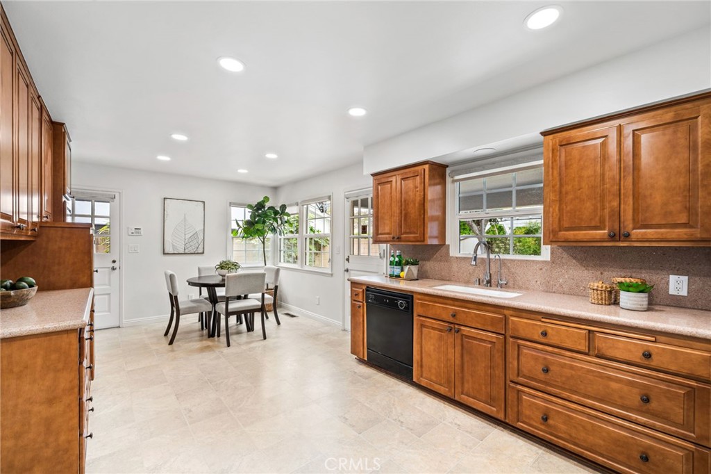 1107 Sharon Road Santa Ana, CA 92706 - Photo 9 of 37 a kitchen with sink and cabinets