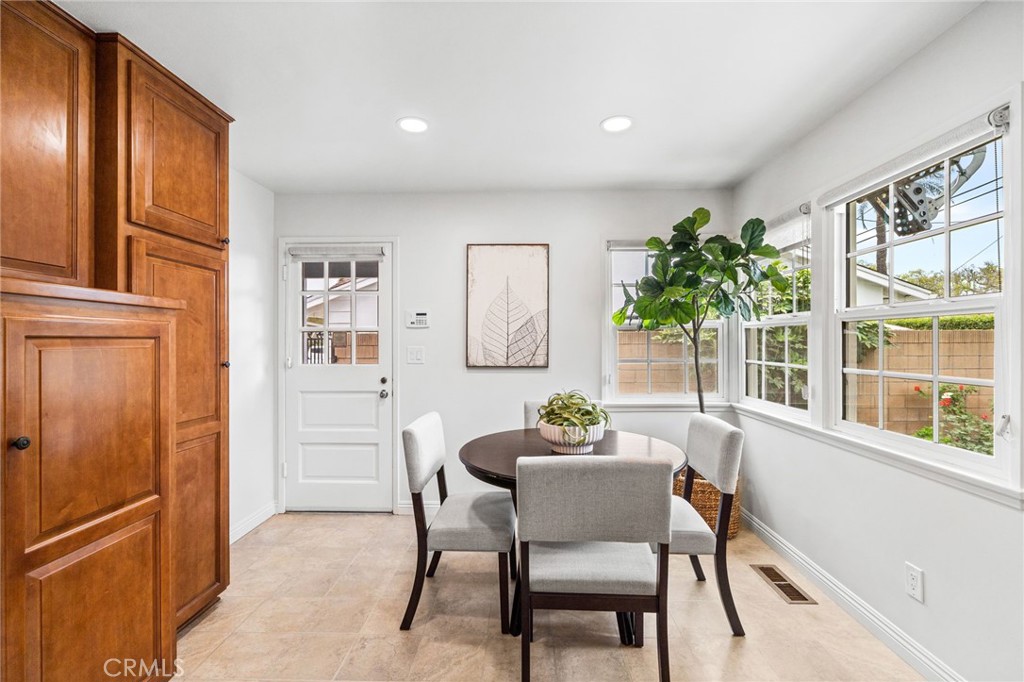 1107 Sharon Road Santa Ana, CA 92706 - Photo 10 of 37 a dining room with furniture and window