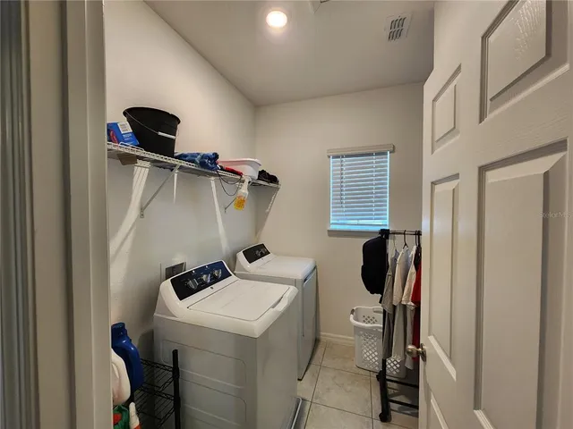 a bathroom with a sink vanity and mirror