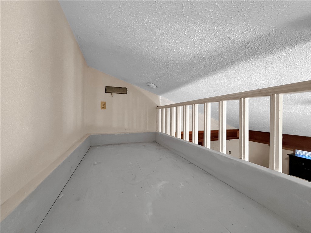910 Twite Circle Corpus Christi, TX 78418 - Photo 33 of 40 a view of an empty room with stairs